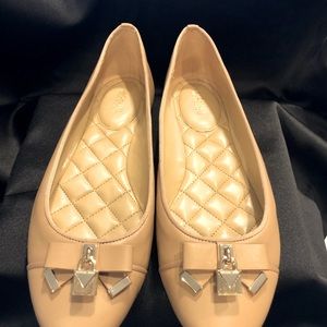 Michael Kors cream flats never worn.  New without tag.  Size 8.5 style # PV18D